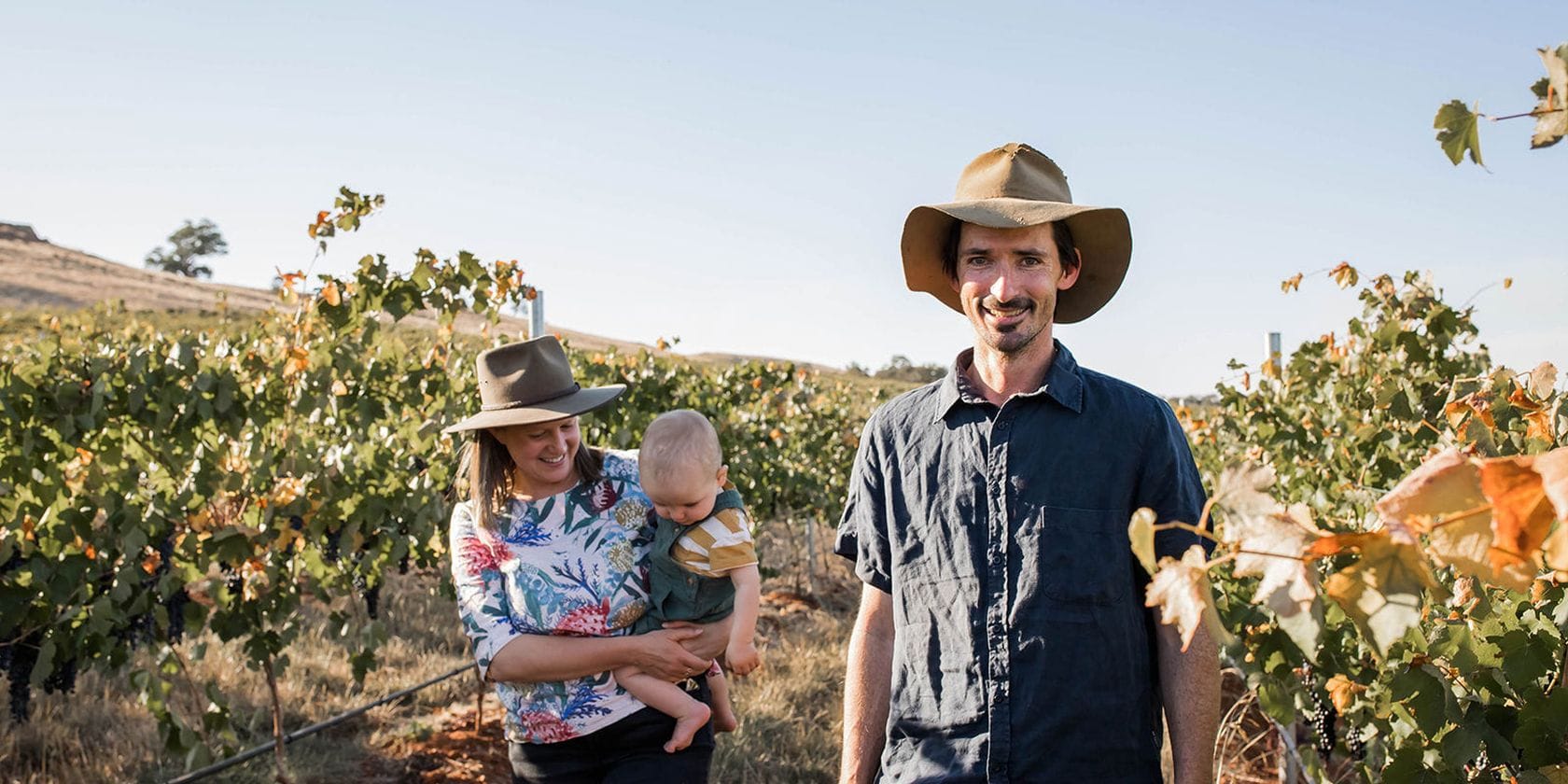 The GKLR Wines family walking through their vineyard